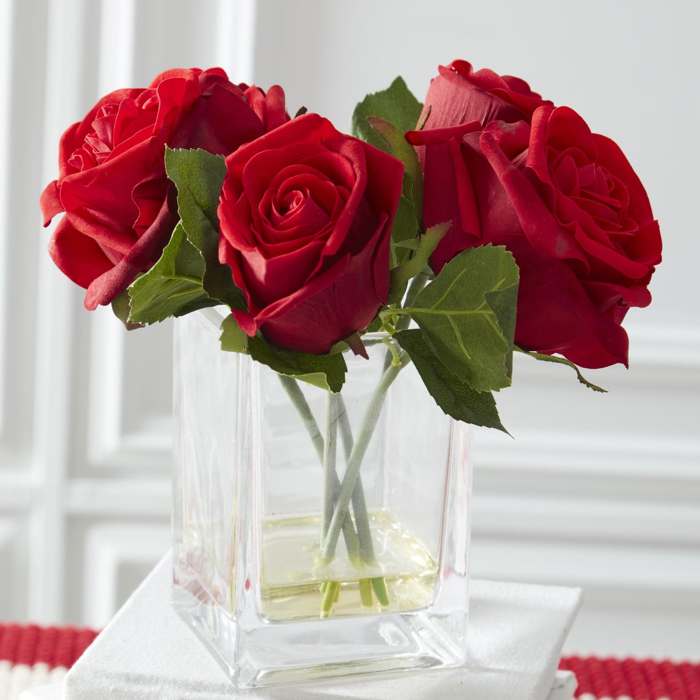 K&K Interiors 8" Real Touch Red Rose Flower Arrangement in Faux Water Glass Vase for Mother's Day