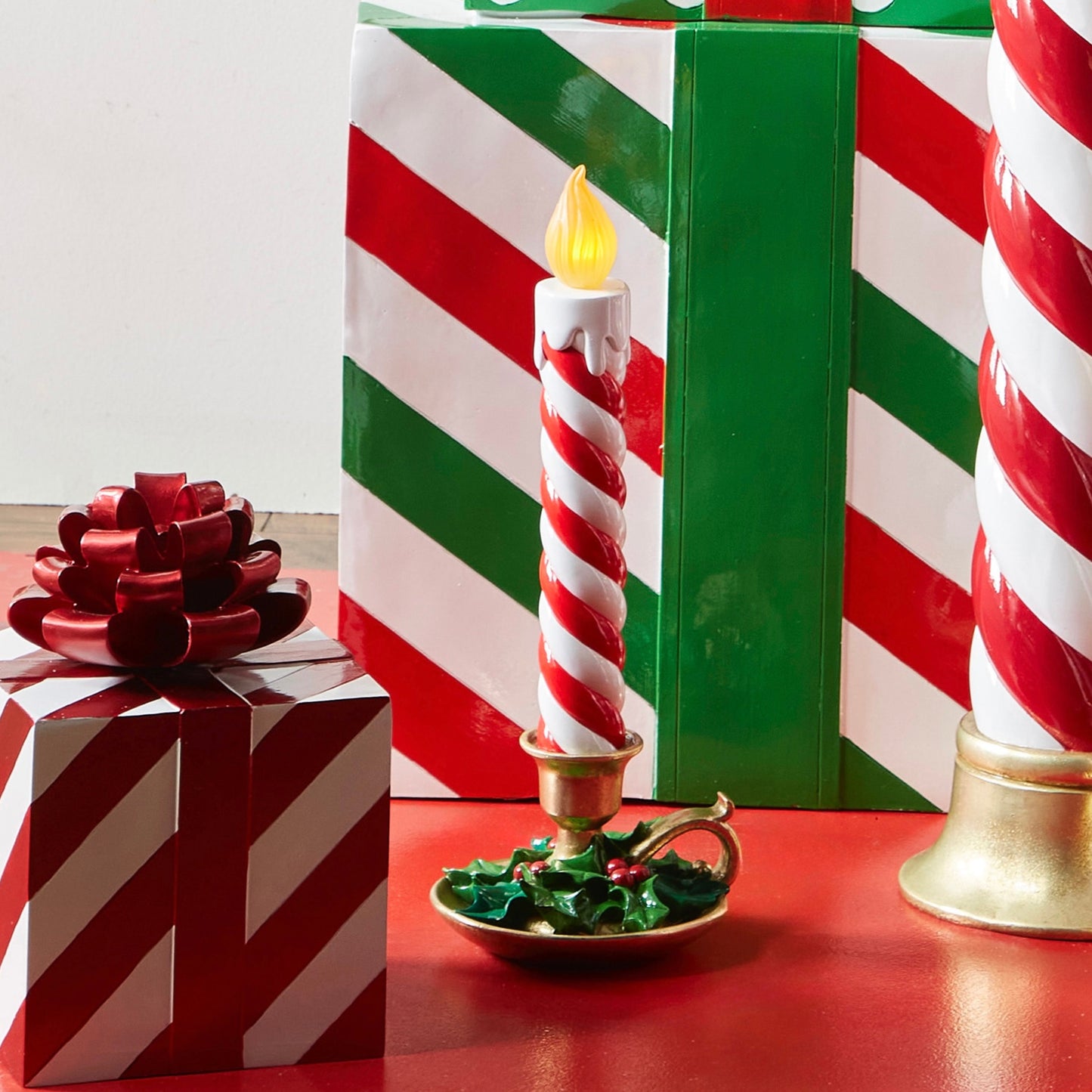 RAZ Imports 17" Candy Cane Striped Over-Sized Resin Light-Up Christmas Candle - Battery-Operated