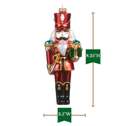 RAZ Imports 8.25" Classic Red Nutcracker with Gift Glass Christmas Ornament