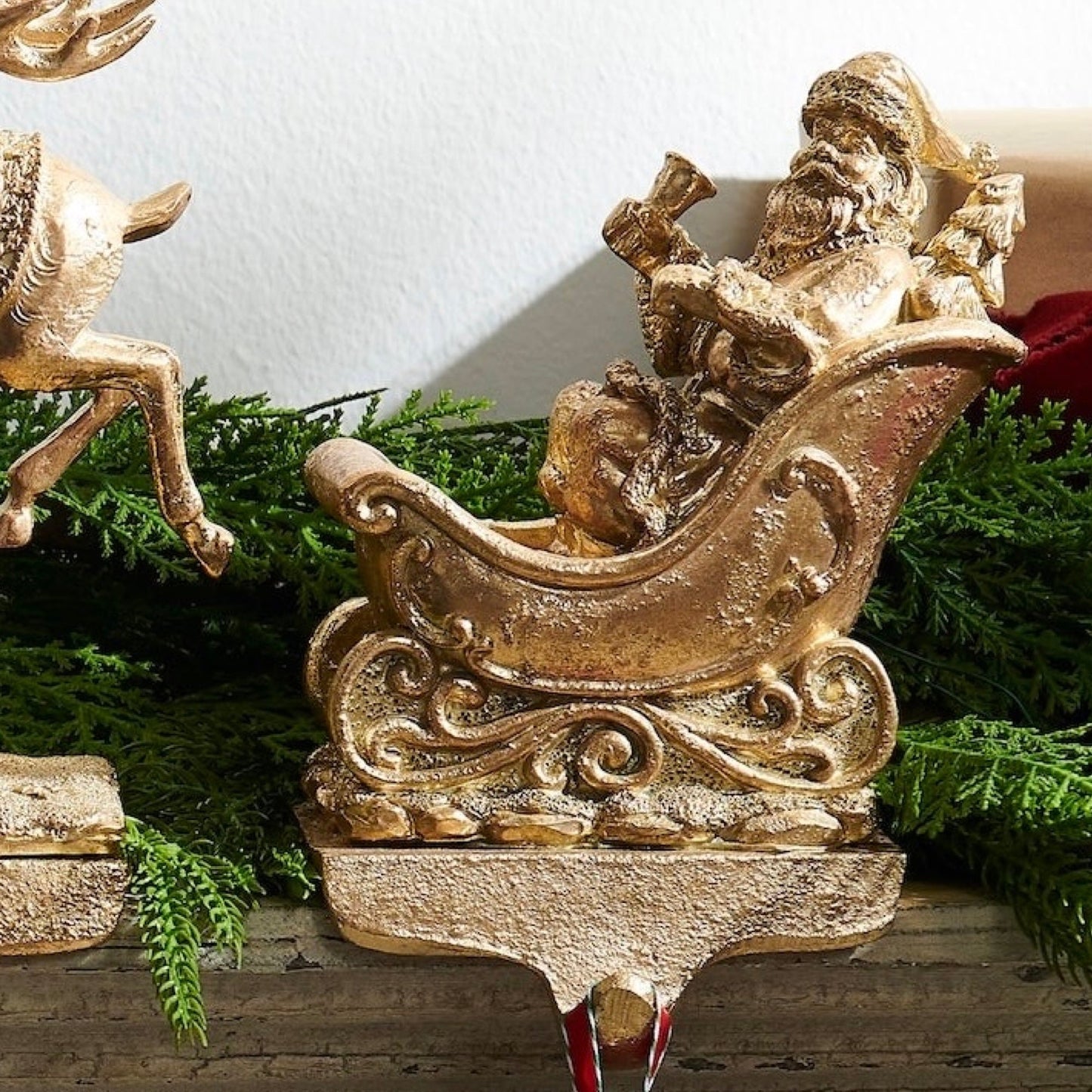 RAZ Imports 10.5" Santa and Reindeer Gold Resin Iron Christmas Stocking Holders - Set of 4