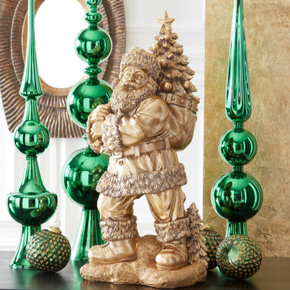 K&K Interiors 23" Gold Resin Santa Claus Statue with Christmas Tree Bag